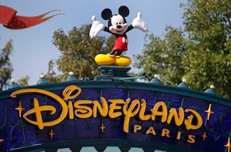 PARIS, FRANCE - JULY 13: The logo of Disneyland Paris is seen at the entrance of the park on July 13, 2020 in Marne-la-Vallee, near Paris, France. After four months of closure, the amusement park officially reopens its doors on Wednesday July 15 with compulsory reservations online. The Disneyland Paris and Walt Disney studio parks have been closed since mid-March due to the coronavirus epidemic (COVID 19). (Photo by Chesnot/Getty Images)