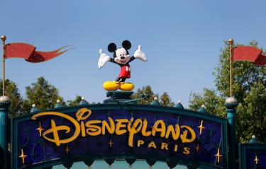 PARIS, FRANCE - JULY 13: The logo of Disneyland Paris is seen at the entrance of the park on July 13, 2020 in Marne-la-Vallee, near Paris, France. After four months of closure, the amusement park officially reopens its doors on Wednesday July 15 with compulsory reservations online. The Disneyland Paris and Walt Disney studio parks have been closed since mid-March due to the coronavirus epidemic (COVID 19). (Photo by Chesnot/Getty Images)