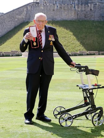 WINDSOR, ENGLAND - JULY 17: Captain Sir Thomas Moore poses after being awarded with the insignia of Knight Bachelor by Queen Elizabeth II at Windsor Castle on July 17, 2020 in Windsor, England. British World War II veteran Captain Tom Moore raised over £32 million for the NHS during the coronavirus pandemic.  (Photo by Chris Jackson/Getty Images)