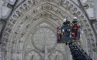 Firefighters are at work to put out a fire at the Saint-Pierre-et-Saint-Paul cathedral in Nantes, western France, on July 18, 2020. - A blaze that broke inside the gothic cathedral of Nantes on July 18 has been contained, emergency officials said, adding that the damage was not comparable to last year's fire at Notre-Dame cathedral in Paris. "The damage is concentrated on the organ, which seems to be completely destroyed. Its platform is very unstable and could collapse," regional fire chief General Laurent Ferlay told a press briefing in front of the cathedral. (Photo by Sebastien SALOM-GOMIS / AFP) (Photo by SEBASTIEN SALOM-GOMIS/AFP via Getty Images)