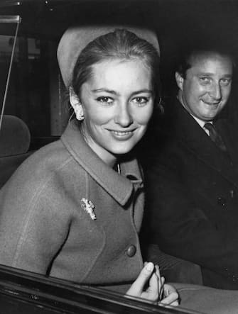 Princess Paola of Belgium (later Queen Paola of Belgium) and her husband Prince Albert of Belgium, later King Albert II of Belgium arrive in London to attend a banquet at Mansion House to celebrate the 75th anniversary of the Belgian Chamber of Commerce in Britain, 25th October 1966. (Photo by Leonard Burt/Central Press/Hulton Archive/Getty Images)