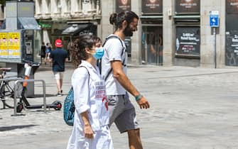 MADRID, SPAIN - JULY 20: A man walks through Puerta del Sol without a mask on July 2, 2020 in Madrid, Spain. Together with the Canary Islands, the Community of Madrid is the only one where it is not yet mandatory to wear a mask. (Photo by David Benito/Getty Images)
