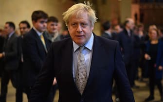 Britain's Prime Minister Boris Johnson greets newly-elected Conservative MPs in the Palace of Westminster, central London on December 16, 2019. - Prime Minister Boris Johnson got down to work Monday following his sweeping election victory, appointing ministers and announcing plans to publish legislation this week to get Britain out of the European Union. (Photo by Leon Neal / POOL / AFP) (Photo by LEON NEAL/POOL/AFP via Getty Images)