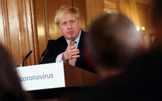Britain's Prime Minister Boris Johnson speaks at a news conference addressing the government's response to the novel coronavirus COVID-19 outbreak, at 10 Downing Street in London on March 12, 2020. - Britain on Thursday said up to 10,000 people in the UK could be infected with the novel coronavirus COVID-19, as it announced new measures to slow the spread of the pandemic. (Photo by SIMON DAWSON / POOL / AFP) (Photo by SIMON DAWSON/POOL/AFP via Getty Images)