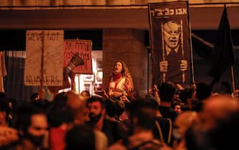 Protesters gather for a demonstration against the Israeli government near the Prime Minister's residence in Jerusalem on July 25, 2020. (Photo by AHMAD GHARABLI / AFP) (Photo by AHMAD GHARABLI/AFP via Getty Images)