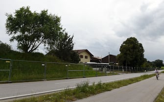 The accommodations of the farm's seasonal workers in the municipality of Mamming where an outbreak of COVID-10 coronavirus cases has raised, are secured from the outside world, in Mamming, southern Germany, on July 26, 2020. - A total of 174 seasonal workers on a large Bavarian farm in the municipality of Mamming have tested positive for the coronavisrus COVID-19 and some 500 are in quarantine to contain a mass coronavirus outbreak. (Photo by Christof STACHE / AFP) (Photo by CHRISTOF STACHE/AFP via Getty Images)