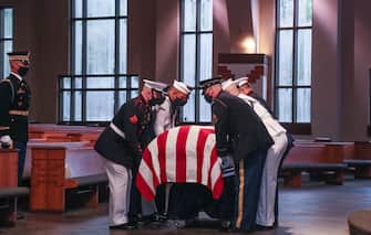 The Honor Guard places the casket of the late Senator and Civil Rights leader John Lewis at the State Capitol in Atlanta, Georgia on July 30, 2020 on the day of his funeral. - Lewis, a 17-term Democratic member of the US House of Representatives from the southern state of Georgia, died of pancreatic cancer on July 17 at the age of 80. (Photo by Alyssa Pointer / POOL / AFP) (Photo by ALYSSA POINTER/POOL/AFP via Getty Images)