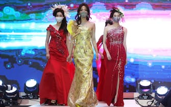 SEOUL, SOUTH KOREA - JULY 24: Models wearing face mask walk the runway during the 2020 Korea Mask Fashion Show amid coronavirus pandemic at the Riverside Hotel on July 24, 2020 in Seoul, South Korea. The country added a further 41 Covid-19 cases today, including 28 local infections, raising the total caseload to 13,979, according to the Korea Centers for Disease Control and Prevention (KCDC). (Photo by Chung Sung-Jun/Getty Images)