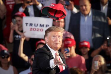 MONTOURSVILLE, PA - MAY 20: U.S. President Donald Trump tosses a hat into the crowd as he arrives for a 'Make America Great Again' campaign rally at Williamsport Regional Airport, May 20, 2019 in Montoursville, Pennsylvania. Trump is making a trip to the swing state to drum up Republican support on the eve of a special election in Pennsylvania's 12th congressional district, with Republican Fred Keller facing off against Democrat Marc Friedenberg. (Photo by Drew Angerer/Getty Images)