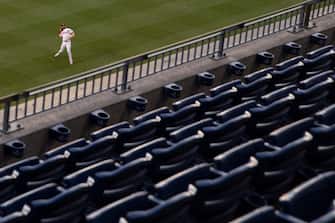 PHILADELPHIA, PA - AUGUST 05: Bryce Harper #3 of the Philadelphia Phillies throws a ball into the empty stands prior to Game Two of the doubleheader against the New York Yankees at Citizens Bank Park on July 27, 2020 in Philadelphia, Pennsylvania. The Yankees defeated the Phillies 3-1. (Photo by Mitchell Leff/Getty Images)