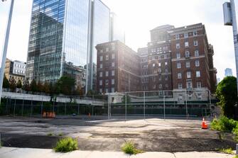 NEW YORK, NEW YORK - JULY 23: A view of an empty lot outside Bellevue Hospital which formerly housed refrigerated trucks and tents used as part of a makeshift morgue as the city enters Phase 4 of re-opening following restrictions imposed to slow the spread of coronavirus on July 23, 2020 in New York City. The fourth phase allows outdoor arts and entertainment, sporting events without fans and media production. (Photo by Noam Galai/Getty Images)