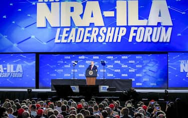 epa07530769 US President Donald J. Trump speaks at the 2019 National Rifle Association (NRA) Annual Leadership Forum at Lucas Oil Stadium in Indianapolis, Indiana, USA, 26 April 2019. The forum is part of the NRA convention where firearms and weapons enthusiasts will view manufacture's exhibits on all things related to firearms, protection, and hunting.  EPA/TANNEN MAURY