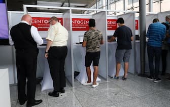 Travel wait inside of the Germany's first walk-in test center for corona viruses (COVID-19) at an airport at Frankfurt International Airport, Germany, 30 June 2020.&nbsp; ANSA/RONALD WITTEK