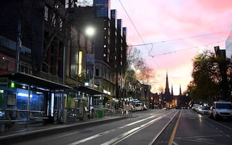 MELBOURNE, AUSTRALIA - AUGUST 11: Empty streets are seen on August 11, 2020 in Melbourne, Australia. Metropolitan Melbourne is under stage 4 lockdown restrictions, with people only allowed to leave home to give or receive care, shopping for food and essential items, daily exercise and work, while an overnight curfew from 8pm to 5am is also in place. The majority of retail businesses are also closed. Other Victorian regions are in stage 3 lockdown. The restrictions, which came into effect from 2 August, have been introduced by the Victorian government as health authorities work to reduce community COVID-19 transmissions across the state. (Photo by Quinn Rooney/Getty Images)