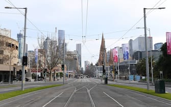 MELBOURNE, AUSTRALIA - AUGUST 11: Empty roads around Melbourne are seen on August 11, 2020 in Melbourne, Australia.  Metropolitan Melbourne  is under stage 4 lockdown restrictions, with people only allowed to leave home to give or receive care, shopping for food and essential items, daily exercise and work while an overnight curfew from 8pm to 5am is also in place. The majority of retail businesses are also closed. Other Victorian regions are in stage 3 lockdown. The restrictions, which came into effect from 2 August, have been introduced by the Victorian government as health authorities work to reduce community COVID-19 transmissions across the state. (Photo by Quinn Rooney/Getty Images)