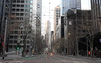 1265124189 MELBOURNE, AUSTRALIA - AUGUST 11: Empty streets are seen on August 11, 2020 in Melbourne, Australia. Metropolitan Melbourne is under stage 4 lockdown restrictions, with people only allowed to leave home to give or receive care, shopping for food and essential items, daily exercise and work, while an overnight curfew from 8pm to 5am is also in place. The majority of retail businesses are also closed. Other Victorian regions are in stage 3 lockdown. The restrictions, which came into effect from 2 August, have been introduced by the Victorian government as health authorities work to reduce community COVID-19 transmissions across the state. (Photo by Quinn Rooney/Getty Images)