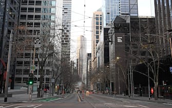 MELBOURNE, AUSTRALIA - AUGUST 11: Empty streets are seen on August 11, 2020 in Melbourne, Australia.  Metropolitan Melbourne is under stage 4 lockdown restrictions, with people only allowed to leave home to give or receive care, shopping for food and essential items, daily exercise and work, while an overnight curfew from 8pm to 5am is also in place. The majority of retail businesses are also closed. Other Victorian regions are in stage 3 lockdown. The restrictions, which came into effect from 2 August, have been introduced by the Victorian government as health authorities work to reduce community COVID-19 transmissions across the state. (Photo by Quinn Rooney/Getty Images)