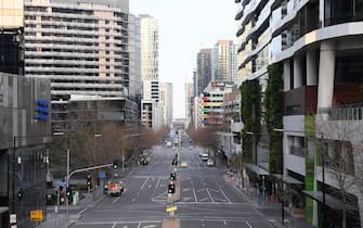 MELBOURNE, AUSTRALIA - AUGUST 11: Empty streets are seen on August 11, 2020 in Melbourne, Australia.  Metropolitan Melbourne  is under stage 4 lockdown restrictions, with people only allowed to leave home to give or receive care, shopping for food and essential items, daily exercise and work while an overnight curfew from 8pm to 5am is also in place. The majority of retail businesses are also closed. Other Victorian regions are in stage 3 lockdown. The restrictions, which came into effect from 2 August, have been introduced by the Victorian government as health authorities work to reduce community COVID-19 transmissions across the state. (Photo by Quinn Rooney/Getty Images)