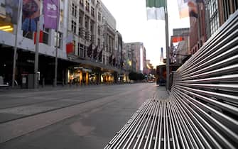 MELBOURNE, AUSTRALIA - AUGUST 11: A very quiet Bourke Street Mall is seen on August 11, 2020 in Melbourne, Australia.  Metropolitan Melbourne  is under stage 4 lockdown restrictions, with people only allowed to leave home to give or receive care, shopping for food and essential items, daily exercise and work while an overnight curfew from 8pm to 5am is also in place. The majority of retail businesses are also closed. Other Victorian regions are in stage 3 lockdown. The restrictions, which came into effect from 2 August, have been introduced by the Victorian government as health authorities work to reduce community COVID-19 transmissions across the state. (Photo by Quinn Rooney/Getty Images)