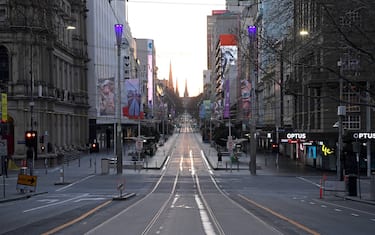 MELBOURNE, AUSTRALIA - AUGUST 11: A very quiet Bourke Street is seen on August 11, 2020 in Melbourne, Australia. Metropolitan Melbourne is under stage 4 lockdown restrictions, with people only allowed to leave home to give or receive care, shopping for food and essential items, daily exercise and work, while an overnight curfew from 8pm to 5am is also in place. The majority of retail businesses are also closed. Other Victorian regions are in stage 3 lockdown. The restrictions, which came into effect from 2 August, have been introduced by the Victorian government as health authorities work to reduce community COVID-19 transmissions across the state. (Photo by Quinn Rooney/Getty Images)