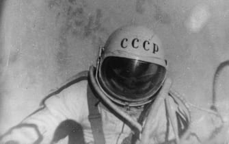 8th August 1965:  A still from a documentary film 'The Man Walking In Space', which followed Russian astronaut Alexei Arkhipovich Leonov on his famous orbit in the spacecraft Voskhod 2. On 18th March 1965, Leonov left the spacecraft for ten minutes to become the first man ever to walk in space.  (Photo by Central Press/Getty Images)