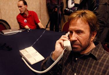 DES MOINES, IA - JANUARY 1:  Actor Chuck Norris talks on the telephone as he campaigns for Republican Presidential Hopeful and former Arkansas Governor Mike Huckabee during the Blogger Bash at the Marriott hotel January 1, 2008 in Des Moines, Iowa. With less than two days to go before the Iowa caucus, Mike Huckabee continues campaigning across Iowa as Mitt Romney catches up in the polls.  (Photo by Justin Sullivan/Getty Images)