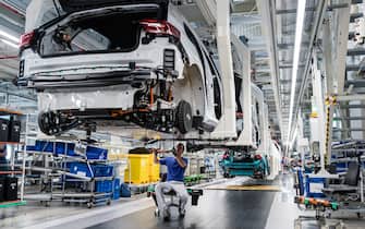 ZWICKAU, GERMANY - JULY 31: A worker assemble VW ID.3 electric cars at the Volkswagen factory on July 31, 2020 in Zwickau, Germany. Volkswagen has started taking orders for the car and is hoping the ID.3 will be an effective competitor to Tesla. (Photo by Jens Schlueter/Getty Images)