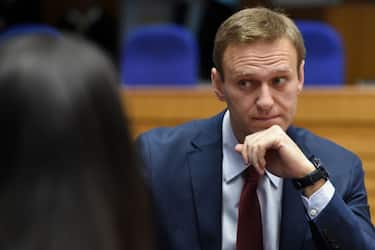 Russian opposition leader Alexei Navalny looks on ahead of a hearing at the European Court of Human Rights (ECHR) in Strasbourg on November 15, 2018. - ?Top Kremlin critic Alexei Navalny heads on November 15 to the European Court of Human Rights which will rule on whether his repeated arrests were politically motivated. The court in Strasbourg must decide whether Navalny, an anti-corruption campaigner and President Vladimir Putin's most vocal critic, was arbitrarily arrested and detained by Russian authorities. Between 2012 and 2014 he was arrested seven times at public gatherings and prosecuted for either breaching procedures for holding public events or disobeying a police order. (Photo by Frederick FLORIN / AFP)        (Photo credit should read FREDERICK FLORIN/AFP via Getty Images)