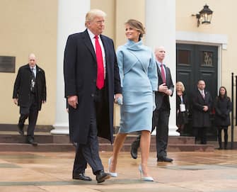 WASHINGTON, DC - JANUARY 20:  President-elect Donald J. Trump and first lady-elect Melania Trump depart St. John's Church on Inauguration Day on January 20, 2017 in Washington, DC. Donald J. Trump will become the 45th president of the United States today.  (Photo by Chris Kleponis - Pool/Getty Images)
