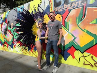 Pilates instructor Juliana Campos, in her carnival costume, with her fiance Cody Bradshaw in Notting Hill, London, on what would have been the weekend of the Notting Hill Carnival. The couple met in Notting Hill in early February and are due to be married on September 4. The 2020 carnival was cancelled due to the coronavirus pandemic, with events being streamed online. (Yui Mok / IPA/Fotogramma, London - 2020-08-30) p.s. la foto e' utilizzabile nel rispetto del contesto in cui e' stata scattata, e senza intento diffamatorio del decoro delle persone rappresentate