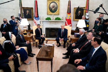 WASHINGTON, DC - SEPTEMBER 15: U.S. President Donald Trump and Foreign Affairs Minister of the United Arab Emirates Abdullah bin Zayed bin Sultan Al Nahyan participate in a meeting in the Oval Office of the White House on September 15, 2020 in Washington, DC. The foreign affairs minister is in Washington to participate in the signing ceremony of the Abraham Accords. (Photo by Doug Mills-Pool/Getty Images)