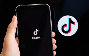 epa08678600 (FILE) - A close-up shows an application 'TikTok' on a smart phone in Berlin, Germany, 07 July 2020 (reissued 18 September 2020). The US Commerce Department on 18 September 2020 announced that downloads of ByteDance's video sharing app TikTok and multi-purpose messaging and payment platform WeChat will be blocked in the US starting 20 September 2020.  EPA/HAYOUNG JEON *** Local Caption *** 56200256