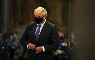 Britain's Prime Minister Boris Johnson wearing a protective face covering, attends a service marking the 80th anniversary of the Battle of Britain at Westminster Abbey in central London on September 20, 2020. - Westminster Abbey has played a central role in remembering the sacrifice of those who fought in the battle, holding a Service of Thanksgiving and Rededication on Battle of Britain Sunday every year since 1944. (Photo by Aaron Chown / POOL / AFP) (Photo by AARON CHOWN/POOL/AFP via Getty Images)