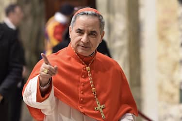 Newly elevated cardinal, Giovanni Angelo Becciu from Italy, attends the courtesy visit of relatives following a consistory for the creation of new cardinals on June 28, 2018 in the Apostolic Palace at St Peter's Basilica in Vatican. (Photo by ANDREAS SOLARO / AFP)        (Photo credit should read ANDREAS SOLARO/AFP via Getty Images)