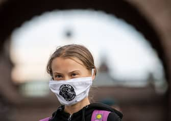 Swedish climate activist Greta Thunberg takes part in a Fridays For Future protest in front of the Swedish Parliament (Riksdagen) in Stockholm on September 25, 2020. (Photo by JONATHAN NACKSTRAND / AFP) (Photo by JONATHAN NACKSTRAND/AFP via Getty Images)