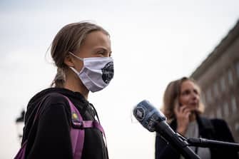 Swedish climate activist Greta Thunberg is interviewed during a Fridays For Future protest in front of the Swedish Parliament (Riksdagen) in Stockholm on September 25, 2020. - Fridays for Future school strike movement called for a global day of climate action on September 25, 2020. (Photo by JONATHAN NACKSTRAND / AFP) (Photo by JONATHAN NACKSTRAND/AFP via Getty Images)