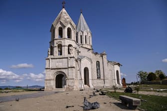 This picture taken on October 8, 2020 shows the damaged Ghazanchetsots (Holy Saviour) Cathedral in the historic city of Shusha, some 15 kilometers from the disputed Nagorno-Karabakh province's capital Stepanakert, after it was hit by a bomb as fighting between Armenian and Azerbaijani forces spilled over today ahead of a first meeting of international mediators in Geneva. - Nagorno-Karabakh broke away from Azerbaijan in a 1990s war that claimed the lives of some 30,000 people. The Armenian separatists declared independence, but no countries recognise its autonomy and it is still acknowledged by world leaders as part of Azerbaijan. (Photo by ARIS MESSINIS / AFP) (Photo by ARIS MESSINIS/AFP via Getty Images)