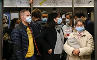 PARIS, FRANCE - OCTOBER 07: Passengers wearing protective face masks are seen in a subway train at Concorde metro station during the coronavirus outbreak (COVID 19) on October 07, 2020 in Paris, France. Since the end of confinement, due to the coronavirus, public transport attendance in Paris has fallen by 40%. A trend that seems to be lasting and Parisians who have now taken up new habits. The epidemic marks a new breakthrough in France with 18,746 new cases and 80 deaths in 24 hours. 40% of resuscitation beds are occupied by Covid-19 patients in Ile-de-France. (Photo by Chesnot/Getty Images)