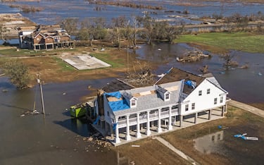epa08735061 A photo made with a drone shows damaged property in Cameron, Louisiana, USA, 10 October 2020. Hurricane Delta came ashore nearby causing widespread damage and power outages to hundreds of thousands of people in Louisiana, Texas and Mississippi just six weeks after Hurricane Laura caused wiidespread damage.  EPA/TANNEN MAURY