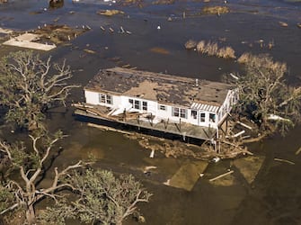 epa08735060 A photo made with a drone shows damaged property in Cameron, Louisiana, USA, 10 October 2020. Hurricane Delta came ashore nearby causing widespread damage and power outages to hundreds of thousands of people in Louisiana, Texas and Mississippi just six weeks after Hurricane Laura caused wiidespread damage.  EPA/TANNEN MAURY