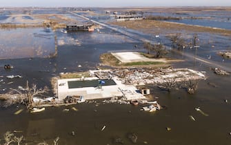 epa08735059 A photo made with a drone shows damaged property in Cameron, Louisiana, USA, 10 October 2020. Hurricane Delta came ashore nearby causing widespread damage and power outages to hundreds of thousands of people in Louisiana, Texas and Mississippi just six weeks after Hurricane Laura caused wiidespread damage.  EPA/TANNEN MAURY