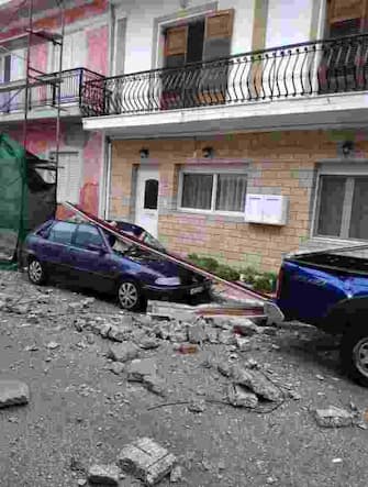 epa08786738 Damages caused to a parked car from debris that fell from a building during an earthquake in Vathy, Samos island, Greece, 30 October 2020. An earthquake measuring 6.7 on the Richter scale was recorded on 30 October at 13:51 in the sea region 16 km north-west of Samos, the Geodynamic Institute of the National Observatory of Athens said. Two children died when a wall fell on them as they were returning from school during the earthquake, the first reported casualties.  The Fire Brigade pulled the children out of the rubble.  EPA/STR  BEST QUALITY AVAILABLE.