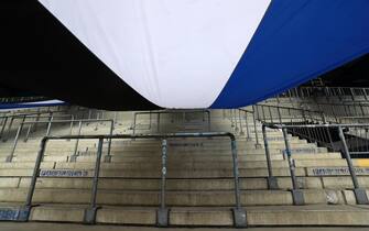 epa08788271  A general view of empty stands as regulations due to COVID-19 mean fans are not able to attend the German Bundesliga soccer match between DSC Arminia Bielefeld and Borussia Dortmund at Schueco Arena in Bielefeld, Germany, 31 October 2020. Sporting stadiums around Germany remain under strict restrictions due to the Coronavirus Pandemic as Government social distancing laws prohibit fans inside venues resulting in games being played behind closed doors.  EPA/Martin Rose / POOL DFL regulations prohibit any use of photographs as image sequences and/or quasi-video.