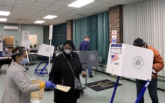 NEW YORK CITY, USA - NOVEMBER 3, 2020: People vote in the 2020 general elections at a polling station in Manhattan on Election Day. The USA elect a president and vice president, 35 Senators, all 435 members of the House of Representatives, 13 governors of 11 states and two US territories, as well as state and local government officials. Incumbent Republican President Donald Trump and Democratic Party nominee Joe Biden are running for president. Maria Khrenova/TASS/Sipa USA