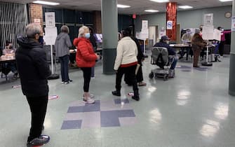 NEW YORK CITY, USA - NOVEMBER 3, 2020: People maintain social distancing at a polling station in Manhattan on Election Day as they wait in line to vote in the 2020 general elections. The USA elect a president and vice president, 35 Senators, all 435 members of the House of Representatives, 13 governors of 11 states and two US territories, as well as state and local government officials. Incumbent Republican President Donald Trump and Democratic Party nominee Joe Biden are running for president. Maria Khrenova/TASS/Sipa USA