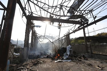 epa08780737 A view of a ruined sewing factory after allegedly Azerbaijani shelling in Stepanakert in Nagorno-Karabakh, 28 October 2020. Armed clashes erupted on 27 September 2020 in the simmering territorial conflict between Azerbaijan and Armenia over the Nagorno-Karabakh territory along the contact line of the self-proclaimed Nagorno-Karabakh Republic (also known as Artsakh).  EPA/VAHRAM BAGHDASARYAN /PHOTOLURE