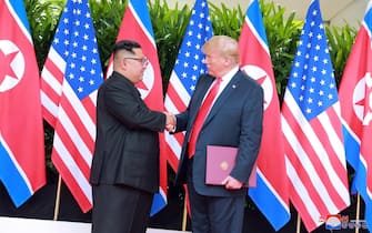 (FILE) - A photo released by the official North Korean Central News Agency (KCNA) shows  Korean leader Kim Jong Un and US President Donald J. Trump (R) during a summit at Sentosa Island, Singapore, 12 June 2018 (reissued 19 January 2019). According to media reports, US President Donald J. Trump and North Korean leader Kim Jong-un are expected to hold a second summit in late February.  ANSA/KCNA   EDITORIAL USE ONLY