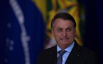 epa08810541 President of Brazil Jair Bolsonaro participates in the launch of the Alliance for Volunteering and the Friends of the Country Award, in Brasilia, Brazil, 09 November 2020.  EPA/Joedson Alves