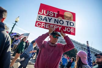 epa08820665 Supporters of US President Donald J. Trump march to the Supreme Court in Washington, DC, USA, 14 November 2020. US President Donald J. Trump has refused to concede the 2020 Presidential election to his Democratic challenger President Elect Joe Biden.  EPA/SHAWN THEW