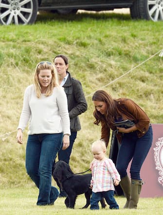 Catherine, Duchess of Cambridge relaxes with Autumn Phillips, toddler Savannah Phillips and her dog Lupo at the Beaufort Polo Club where Prince William and Prince Harry were playing in a charity match on June 17, 2012 (None - 2012-06-17, Anwar Hussein / IPA) p.s. la foto e' utilizzabile nel rispetto del contesto in cui e' stata scattata, e senza intento diffamatorio del decoro delle persone rappresentate